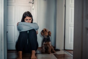 depressed woman with dog