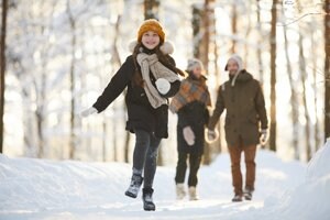 Girl running in the snow