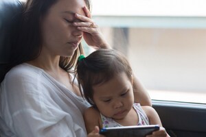 tired mom with child