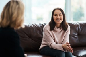 woman talking to therapist