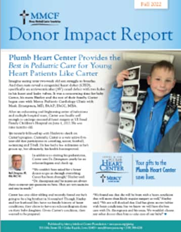 donor impact report cover includes boy holding ultrasound photos