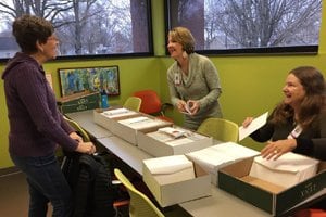 Volunteers stuffing envelopes