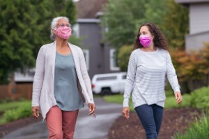 women in masks outdoors